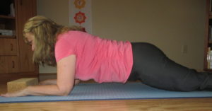 Variation Two: Peel hips off the floor. Knees and legs are still on the ground. Breathing!