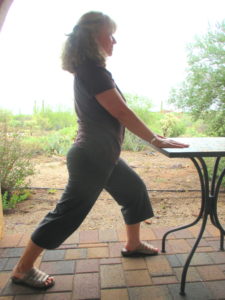 Yoga osteoporosis warrior one variation.