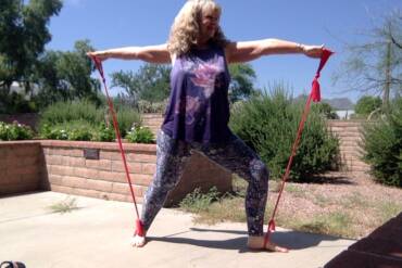 Yoga outside with resistance bands